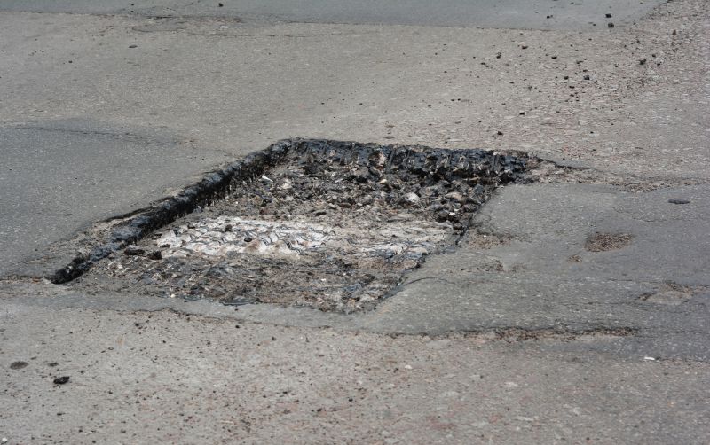 Common Causes Of Asphalt Damage In Commercial Parking Lots